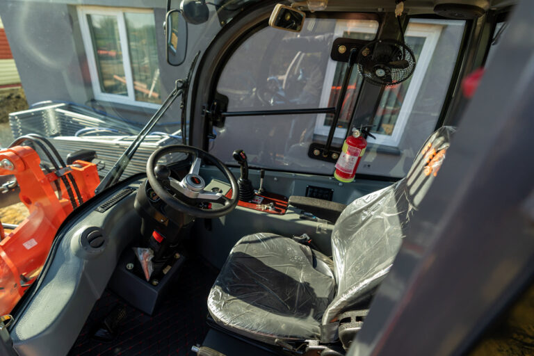 ROPS & FOPS-certified air-conditioned cabin for operator safety and comfort